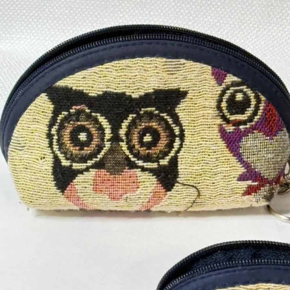 Three nesting owl tapestry coin purses.